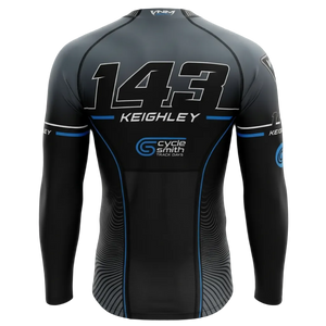 A long-sleeve athletic jersey shown from the back on a black background. The jersey is primarily black and dark gray with white and blue graphics, featuring the number 143, the name KEIGHLEY, and sponsor logos including Cycle Smith Track Cars.