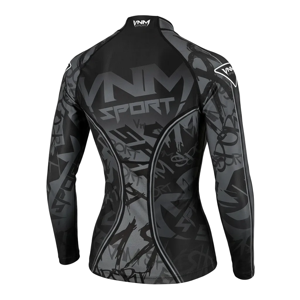 A long-sleeve athletic rash guard shown from the back, featuring a black and gray abstract graffiti-style pattern with 'VNMS SPORT' printed across the upper back and 'VNMS' on the shoulders, set against a solid black background.