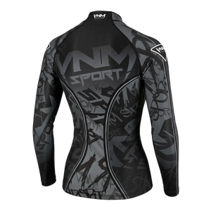 A long-sleeve athletic rash guard shown from the back, featuring a black and gray abstract graffiti-style pattern with 'VNMS SPORT' printed across the upper back and 'VNMS' on the shoulders, set against a solid black background.