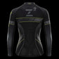 Black long-sleeve athletic compression shirt with gray and neon yellow accents, featuring a large 'Z2' logo on the back, shown against a solid black background.