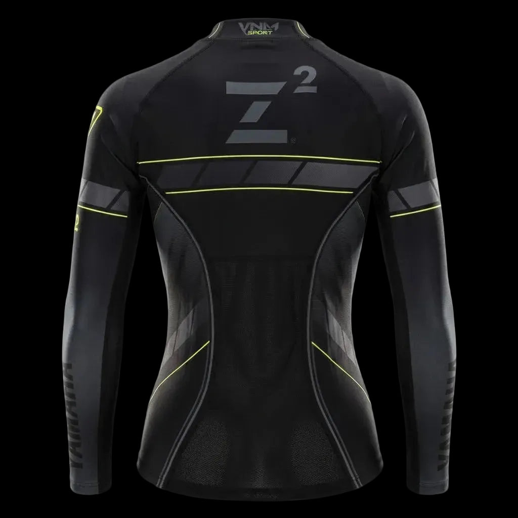 Black long-sleeve athletic compression shirt with gray and neon yellow accents, featuring a large 'Z2' logo on the back, shown against a solid black background.